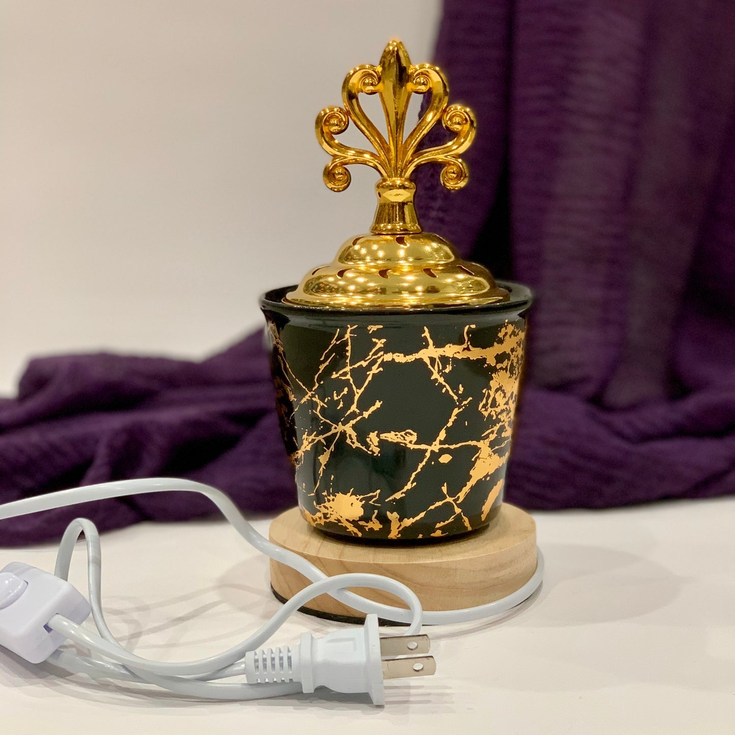 Electric Bakhoor /Oud Burner with custom made 120v plug Good for Canada and USA only. Just add your bakhoor (sold separately) and plug into an outlet and turn on the switch on the unit and enjoy a wonderful scent in your home. Turn the unit on for 20 minutes. the wooden base is part of the unit and protects your counters/table on which the unit is kept from getting hot Unit can get hot. Please keep away from small children.