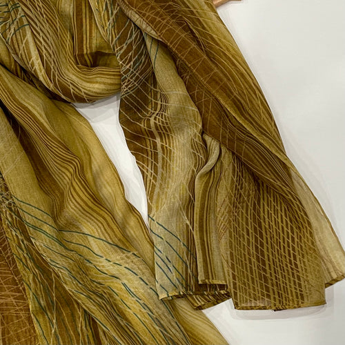 Make sure you stand out in our Mustard Printed Hijab! This hijab boasts a unique mustard abstract print with subtle hints of teal and yellow for a chic, fashionable look. Crafted with quality fabric, this stylish hijab will bring you comfort and style in one.