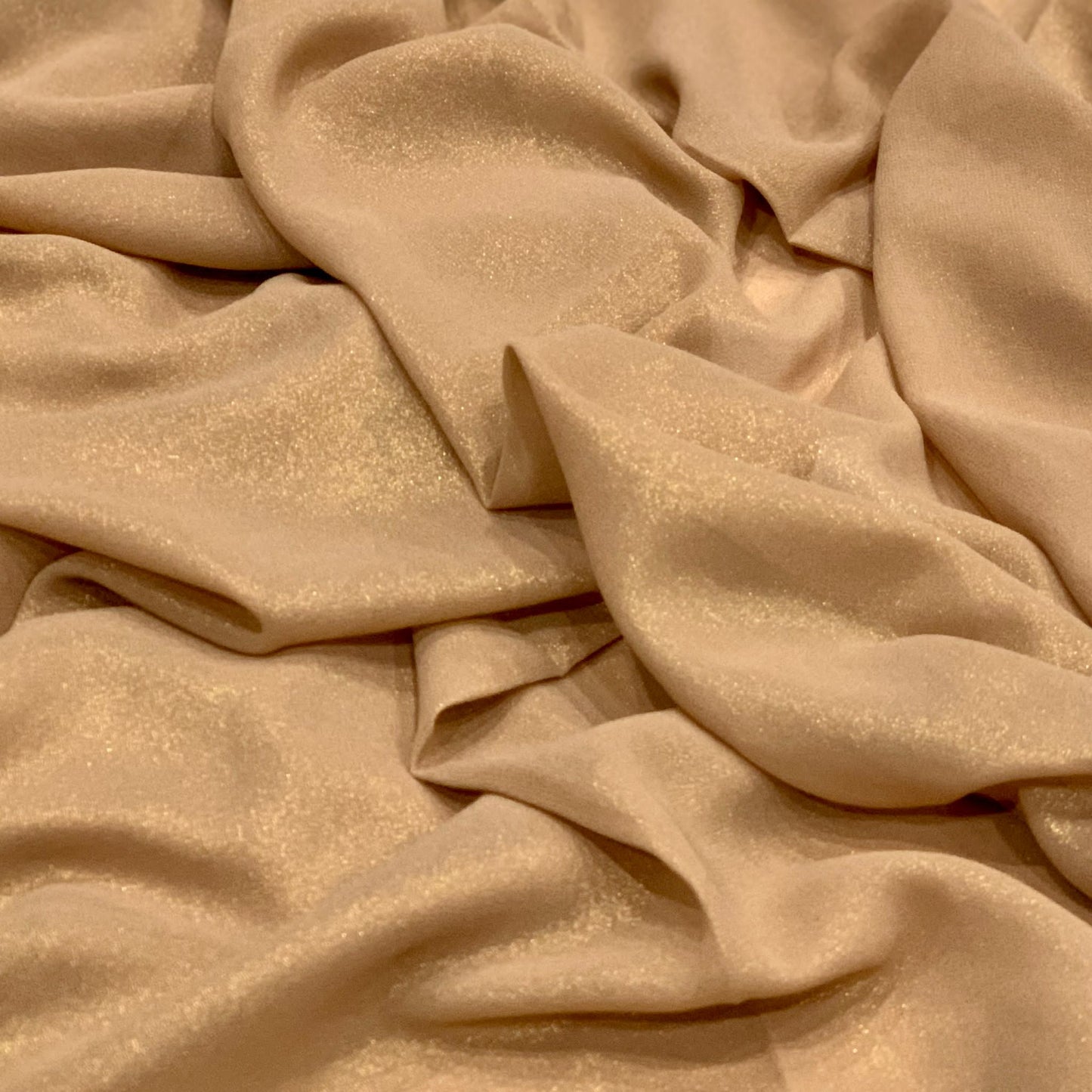 Dark Gold Shimmer Chiffon Hijab  https://www.arifasboutique.com/products/beige-gold-shimmer-chiffon-hijab  Shimmer Chiffon Hijabs are the perfect balance of style and shine. The perfect piece to compliment your outfit for any occasion Material: 100% Polyester Size: 180 cm x 70 cm 