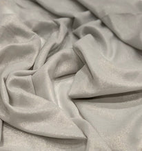 Load image into Gallery viewer, Silver Shimmer Chiffon Hijab scarf  https://www.arifasboutique.com/products/silver-shimmer-chiffon-hijab  Shimmer Chiffon Hijabs are the perfect balance of style and shine. The perfect piece to compliment your outfit for any occasion. Material: 100% Polyester Size: 180 cm x 70 cm Color may look different due to different screen resolution
