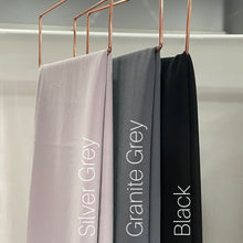Load image into Gallery viewer, Black Chiffon Hijab  https://www.arifasboutique.com/products/chiffon-hijab-black  Our chiffon hijabs are lightweight and airy allowing for a versatile look from casual to formal. A closet staple made from a comfortable textured chiffon material. We have handpicked each of our colours providing you with a wide range to choose from. Size 180 cm x 70 cm
